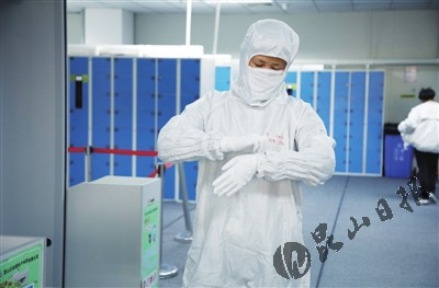 正月初五,位于高新区的昆山丘钛微电子科技股份有限公司生产车间里,身